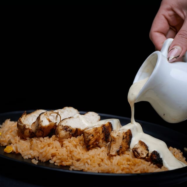 Arroz con Pollo (ACP) (Rice with Chicken).